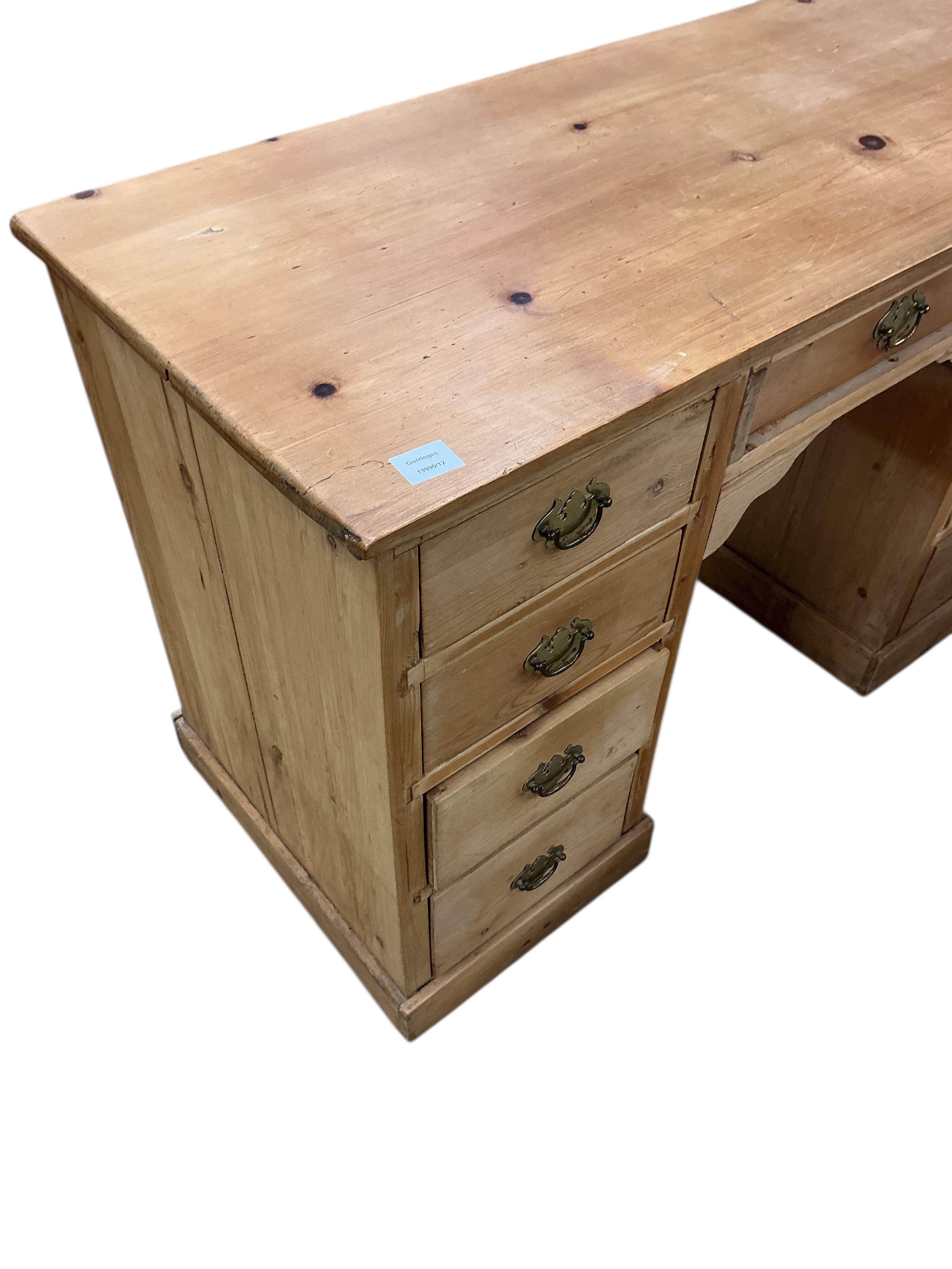 A late Victorian pine kneehole dressing table, width 122cm, depth 51cm, height 78cm
